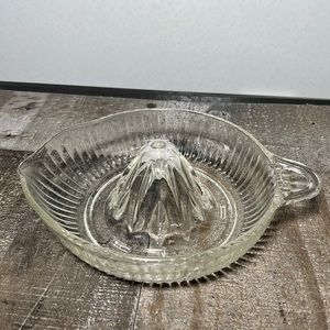 Antique Clear Glass Juicer with a Spout and Handle